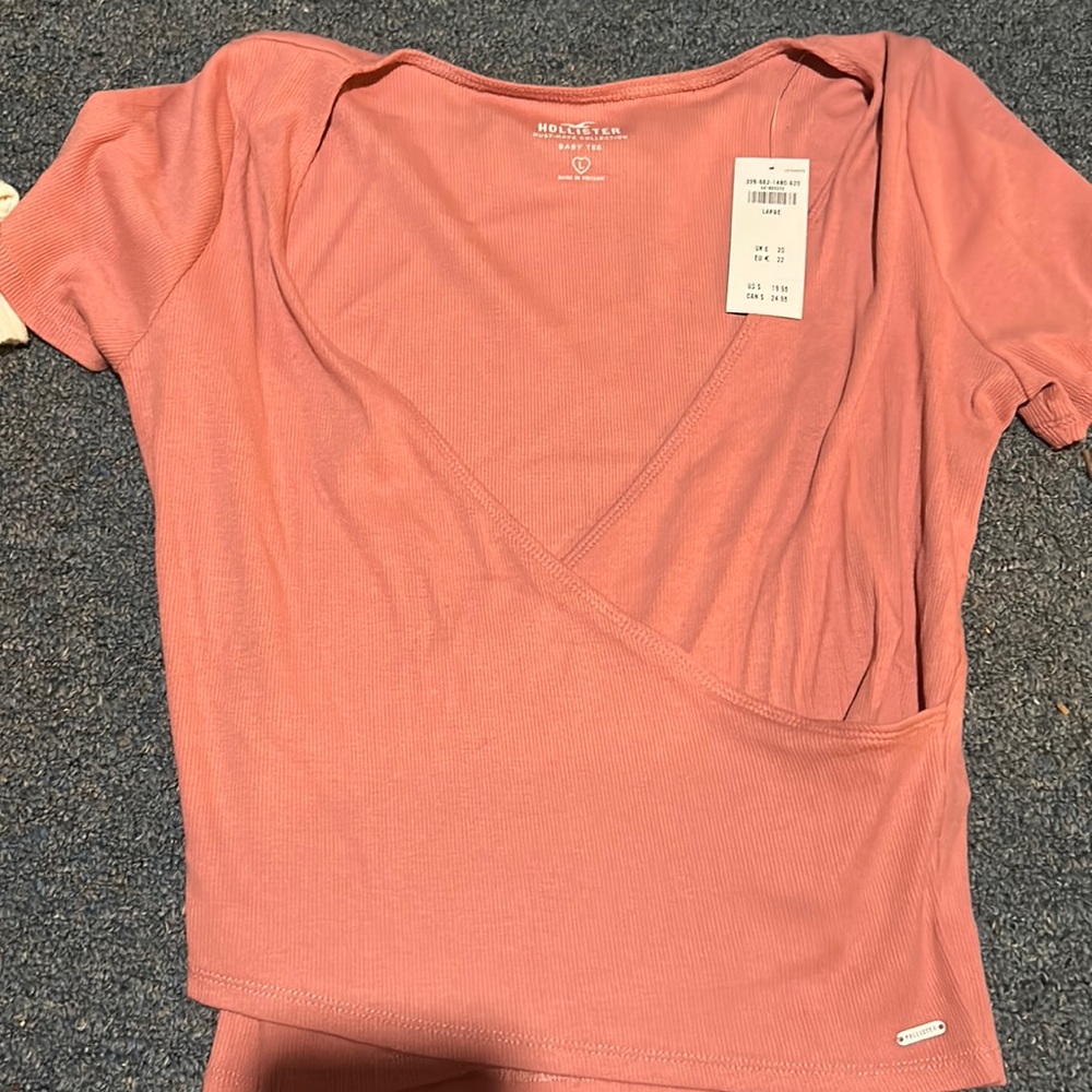 Never been worn cross over tee shirt